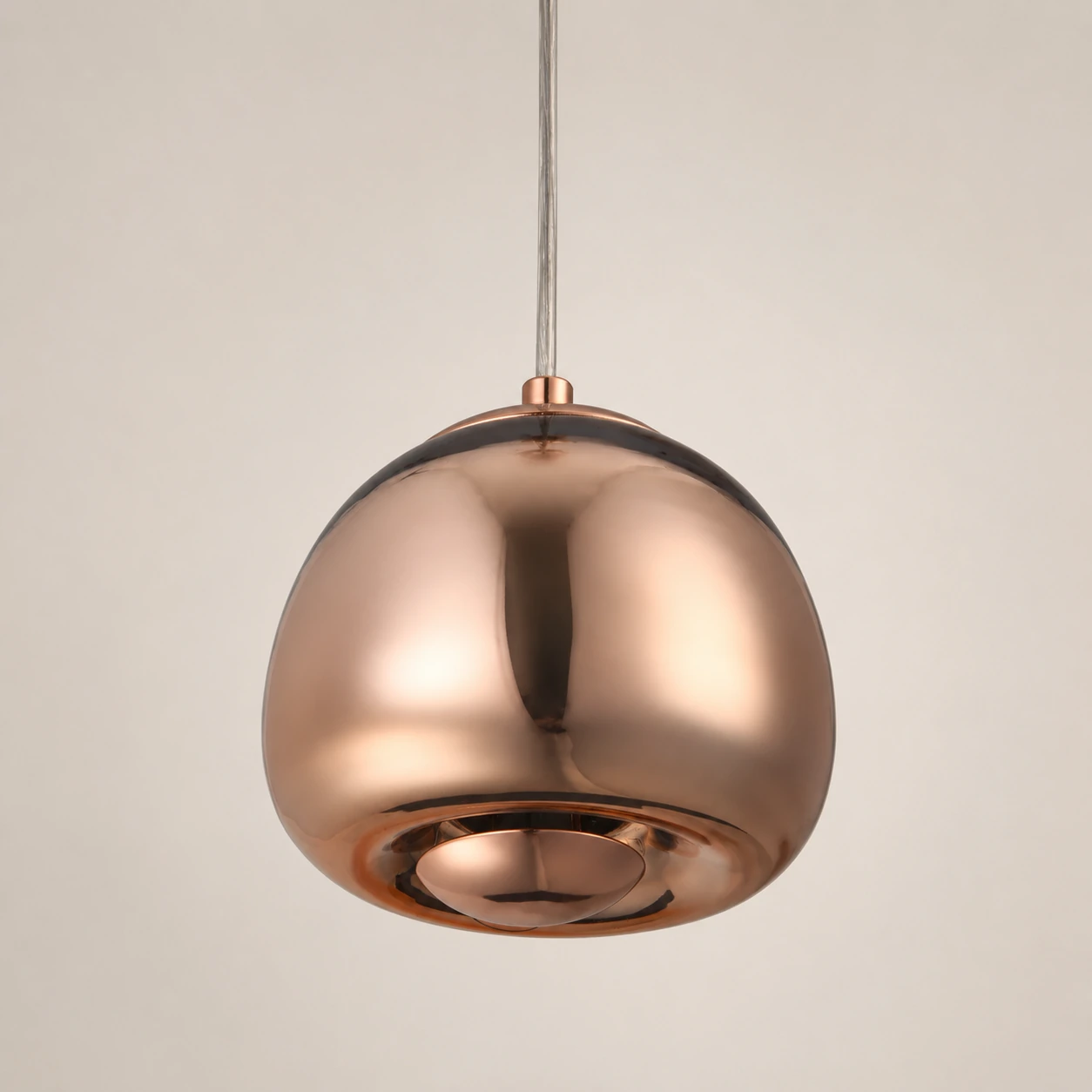 Detail of the Cacoon pendant with polished copper finish
