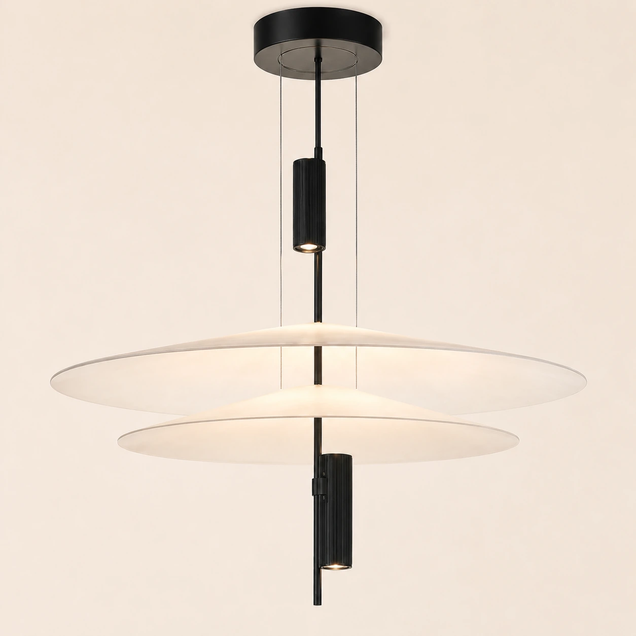 Detail of the Orbit Circle pendant luminaire with translucent discs and black finish
