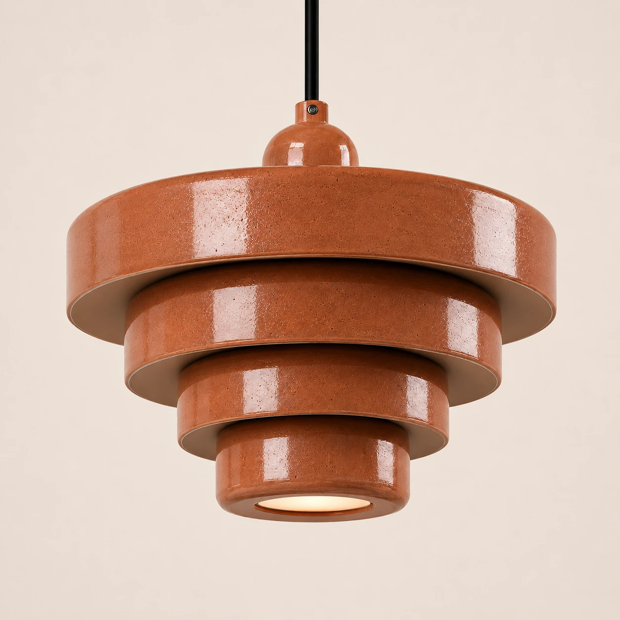 Detail of the Terra Strata pendant in terracotta ceramic with layered forms