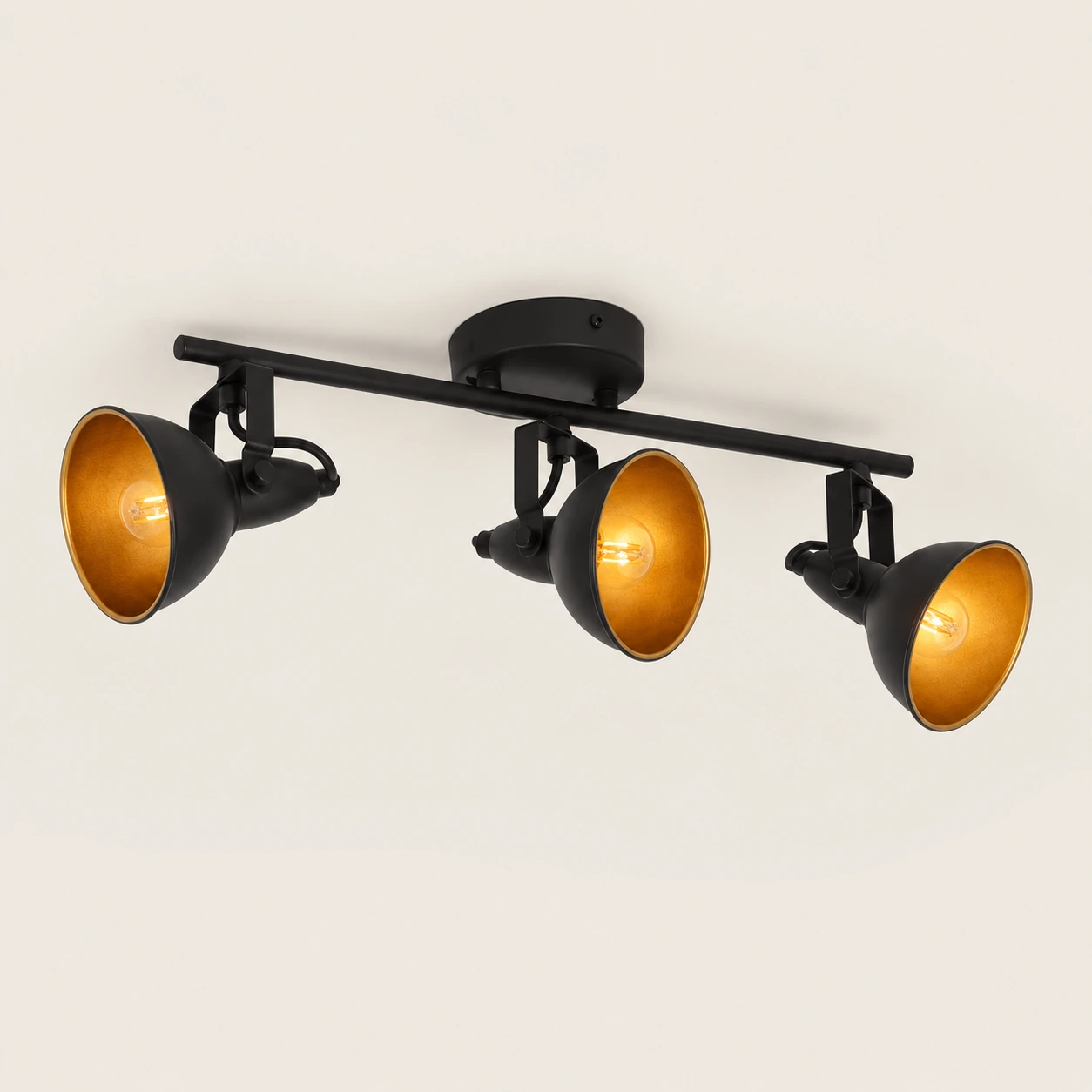 NERO black ceiling light with gold interior and three adjustable spotlights