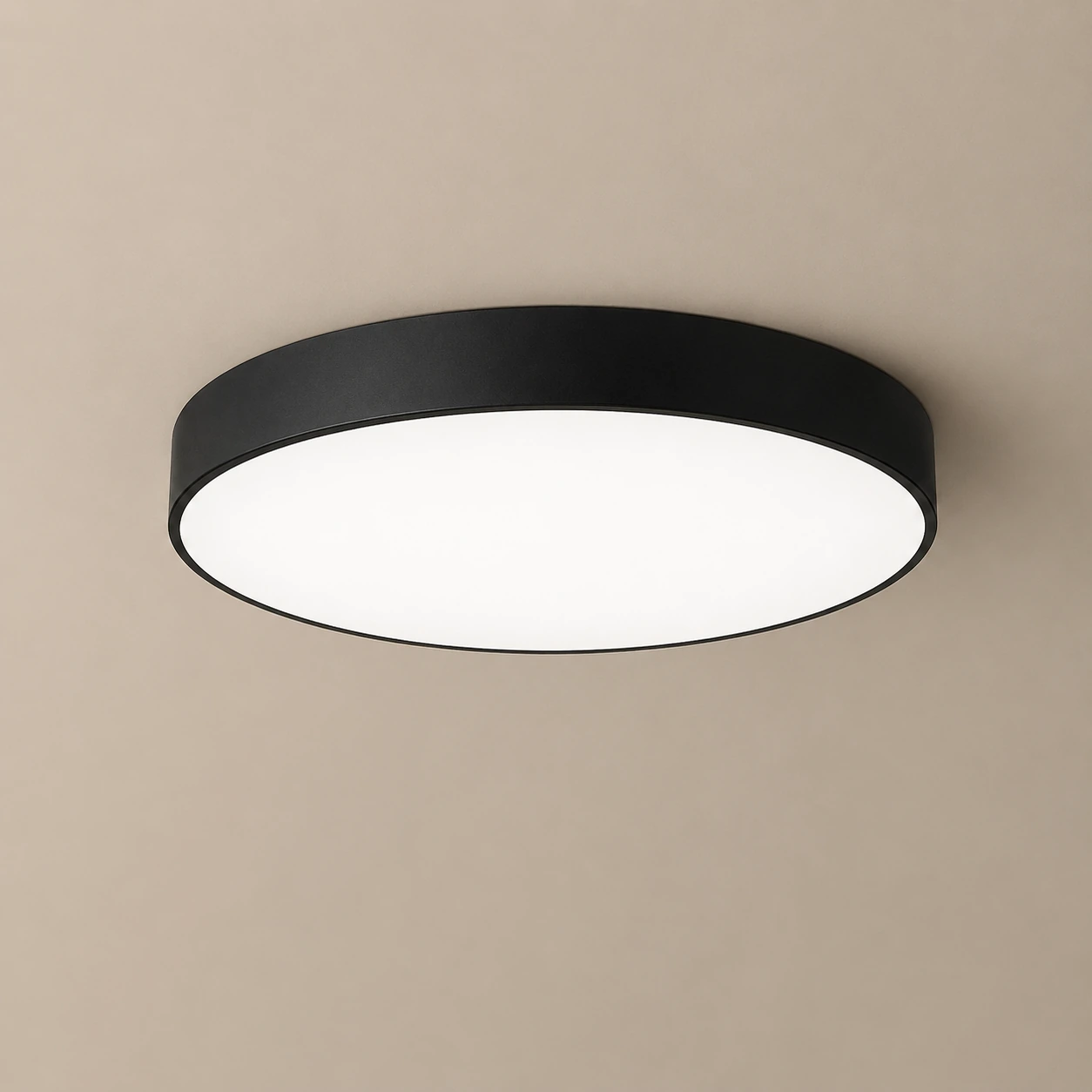 SATURN circular ceiling light with black ring and opal diffuser